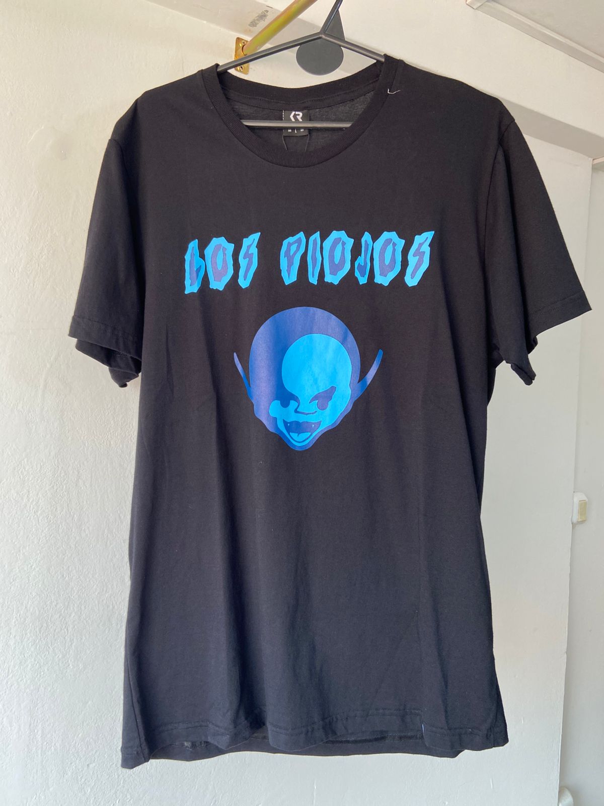 REMERA LOS PIOJOS NEGRA S-L